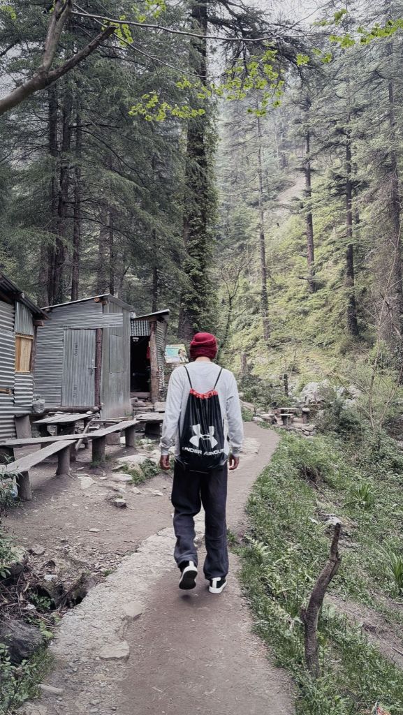 Lonely man walking in mountains
